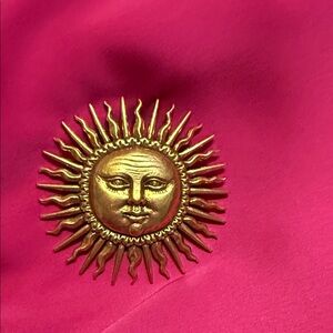 Gold Sun Brooch signed MMA USA